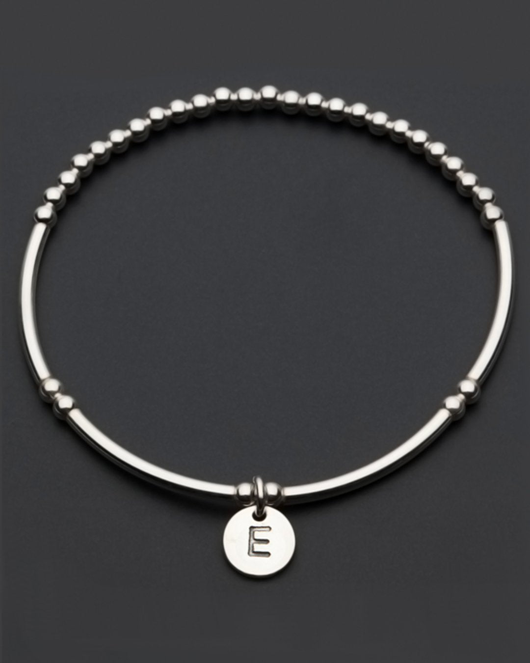 Sterling silver bead stretch bracelet with letter E charm detail by Petals Australia