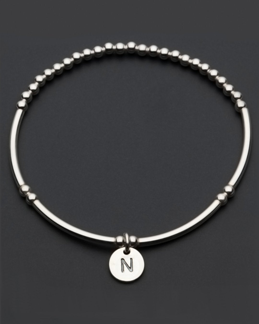 Sterling silver bead stretch bracelet with letter N charm detail by Petals Australia