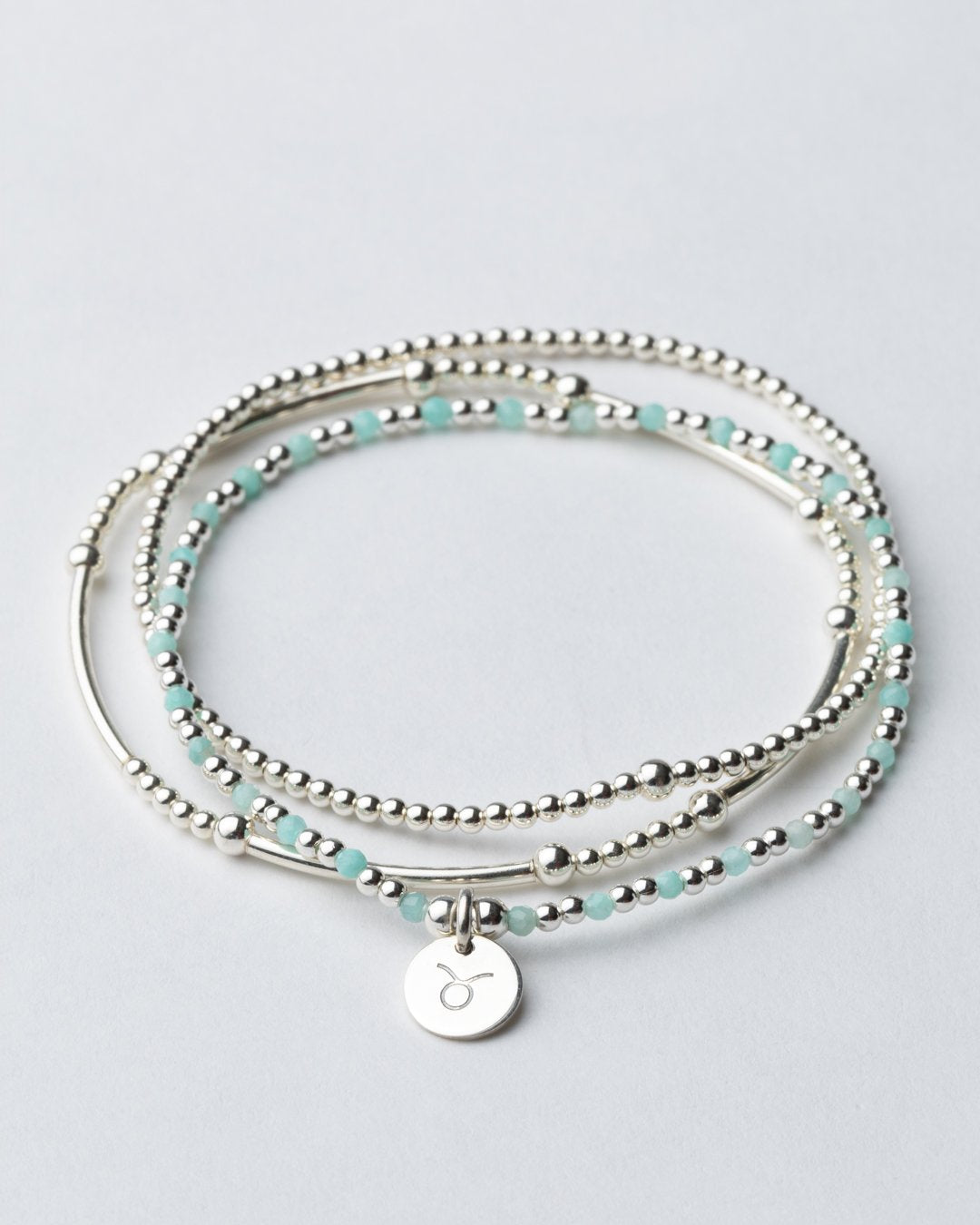 Sterling silver Taurus bracelet stack by Petals Australia with amazonite stretch bracelet and zodiac charm