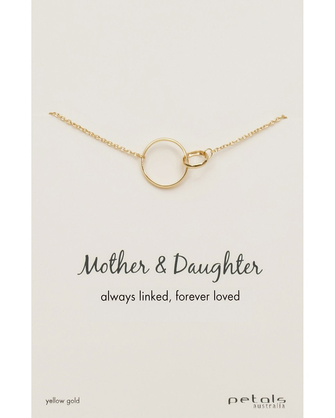 A gold-colored necklace with a double circle pendant, presented on a card that reads 'Mother & Daughter always linked, forever loved.'.